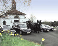 Jaguar hearse and limousine and horse drawn hearse